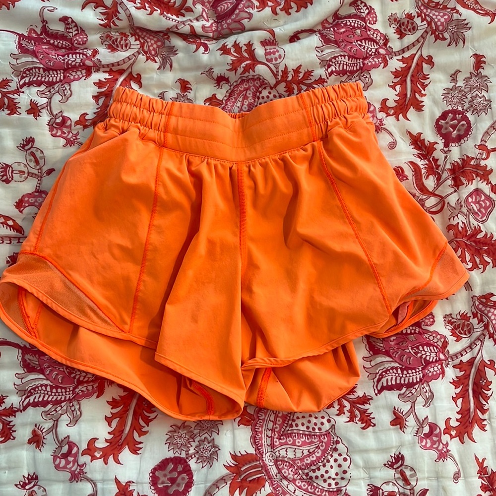 Size 4 lululemon hotty hot shorts. HIGHLIGHT ORANGE